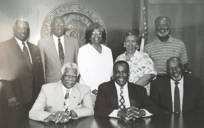 Group photo of first MCAAE councilmembers with Mayor Norm Rice in 1995