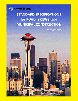 Front cover of the 2023 Standard Specifications, with a photograph of downtown Seattle.