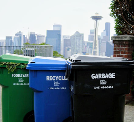 Solid waste bins sit on a Seattle street