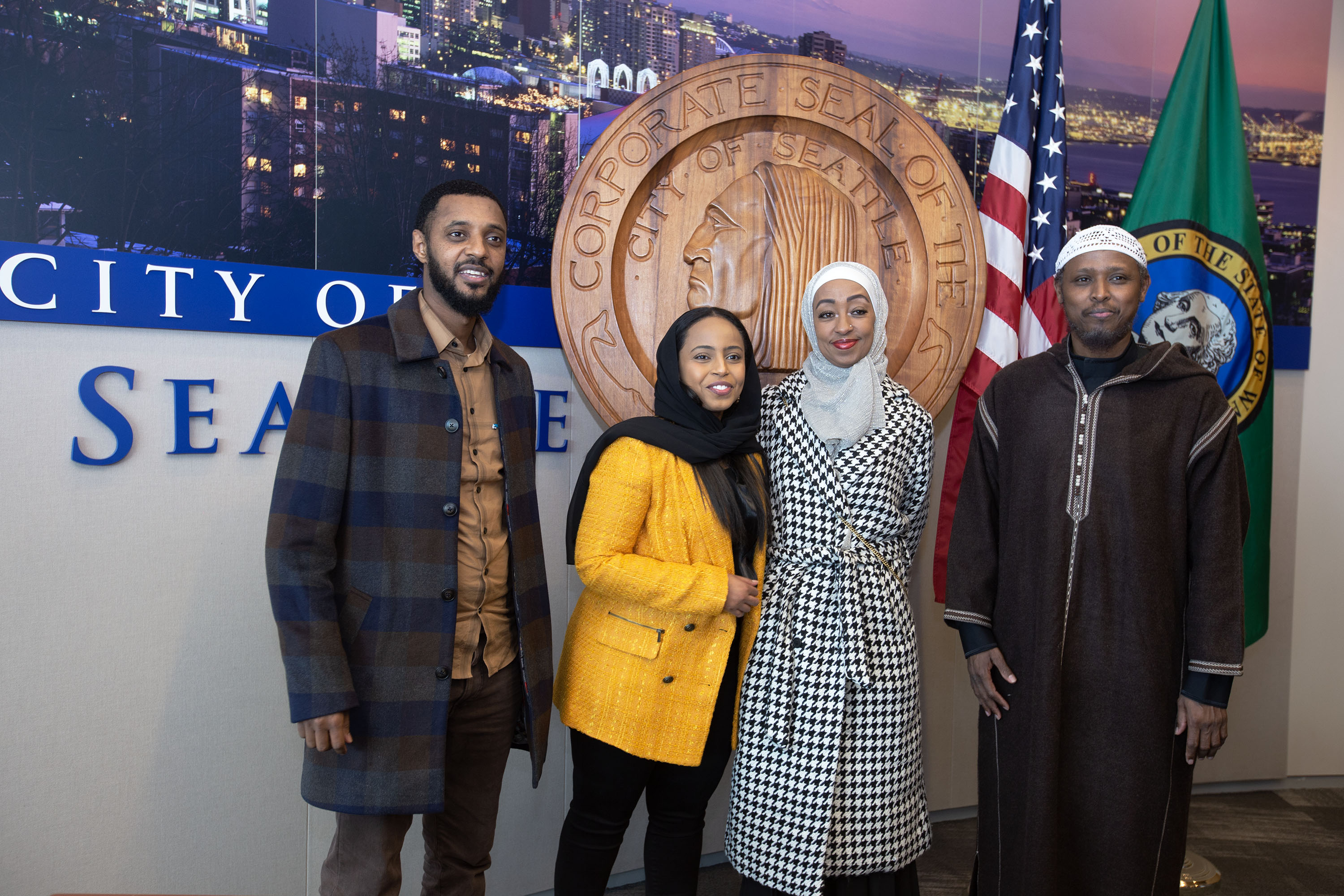 CPC's Engagement specialist Mergitu Argo and Seattle Office of Immigrant Affairs, Hamdi Mohamed, with community faith leaders