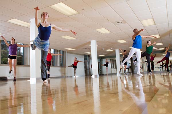10 dancers practicing dance routines in the Grand Rehearsal Hall