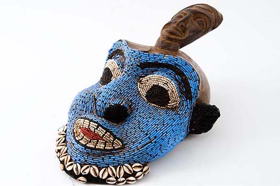 Ceremonial Mask, 20th Century, Wood, Beads, Cowrie shells, courtesy of the American History Traveling Museum: The Unspoken Truths