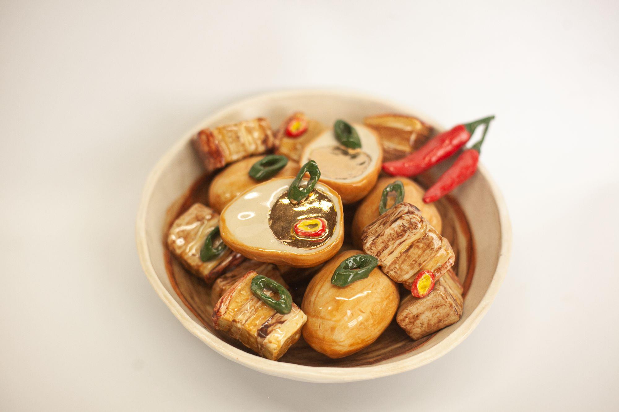 Realistic ceramic sculpture of Vietnamese food