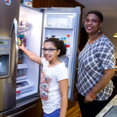 Family with Fridge Photo, Source: Marcela Gara, Resource Media, Flickr