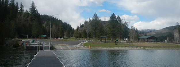 A view of a campsite shoreline from the water