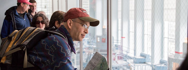 Visitors looking down at the Gorge Powerhouse machinery