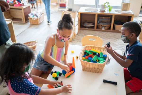 Preschool children of varied ethnicities playing in an SPP classroom