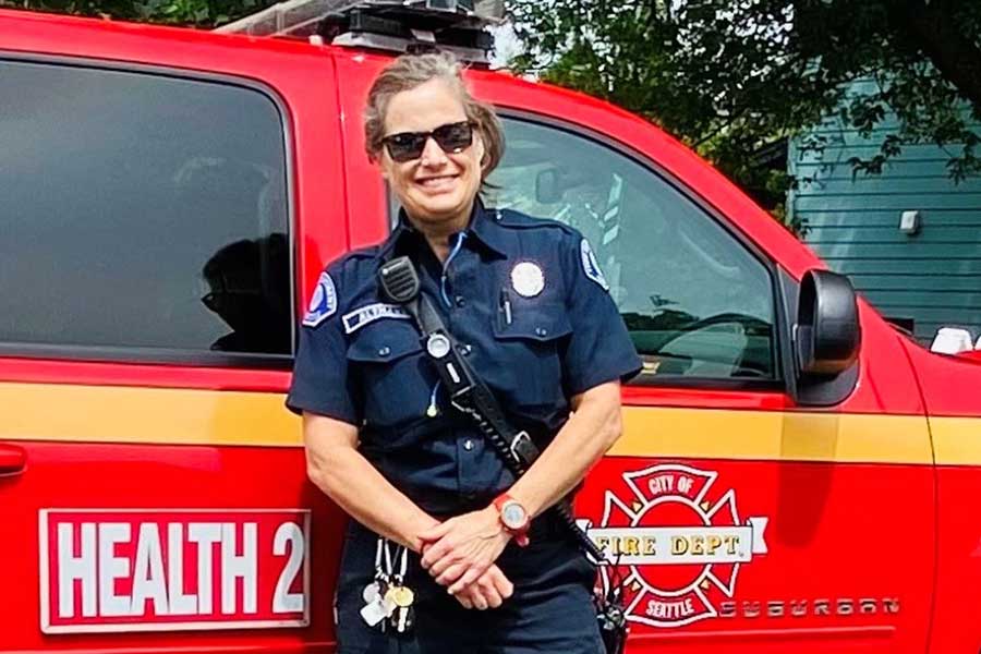 Firefighter Lynn Altmann working on the Health One program