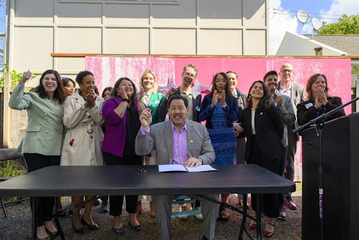 Seattle Mayor Bruce Harrell signs the One Seattle Earth Day Executive Order Order