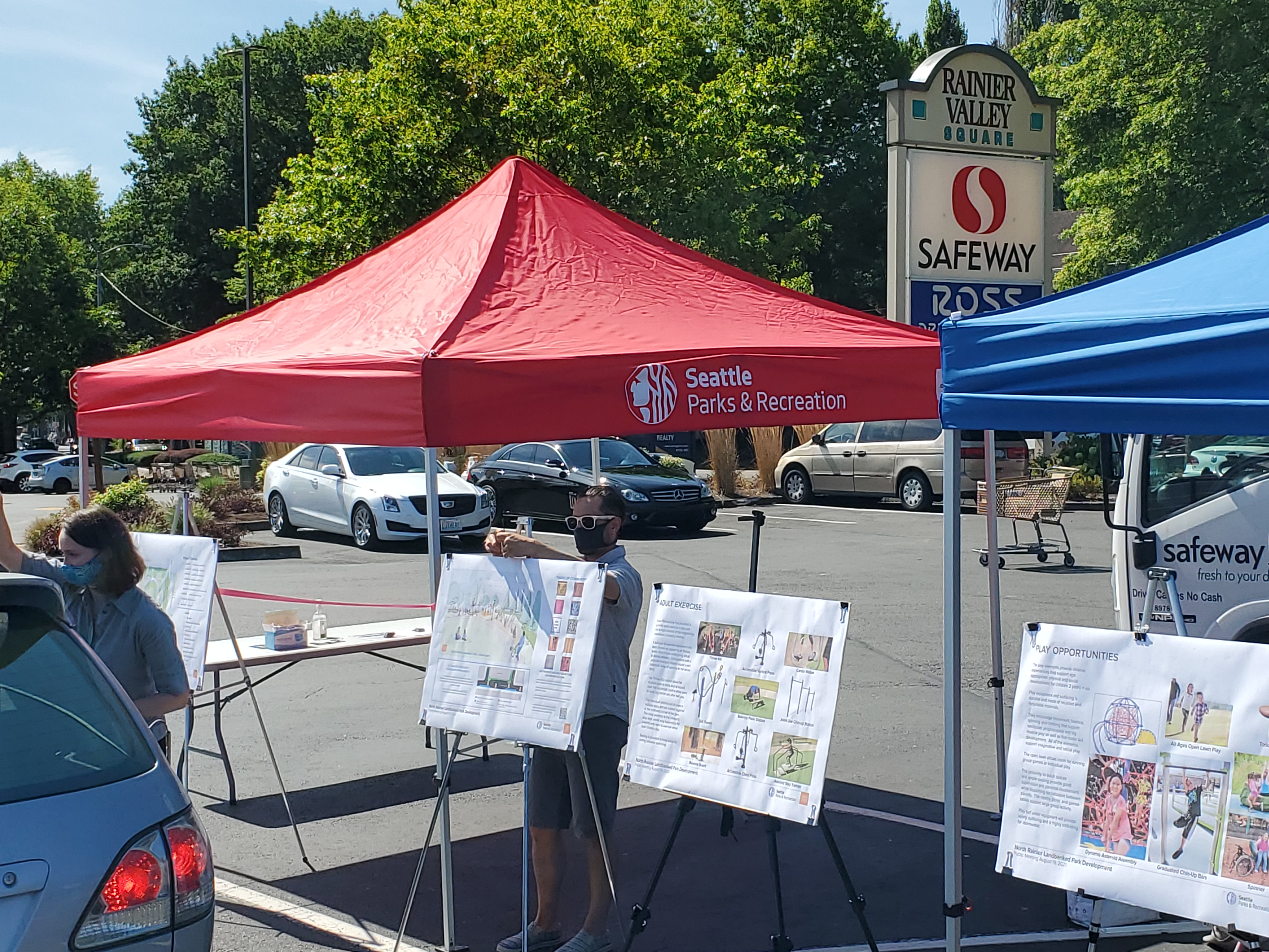 staff at outdoor open house in parking lot