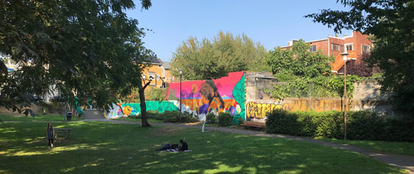 Nearly completed mural art on the stairs area and the large wall. 