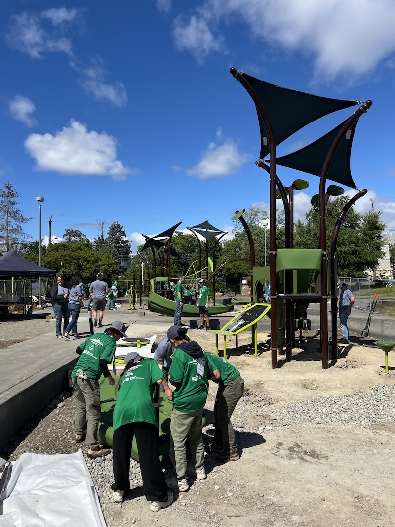 Volunteers building the play area at TT minor