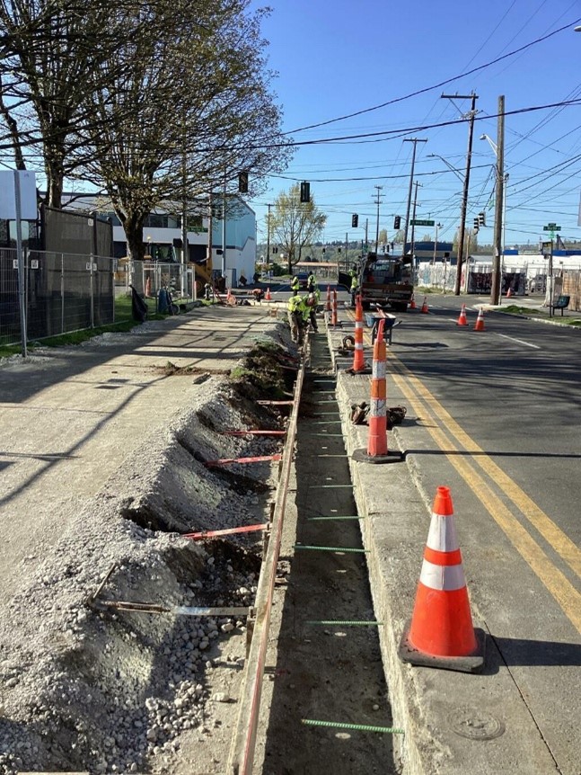 Crews creating a base to install the new multi-use trail