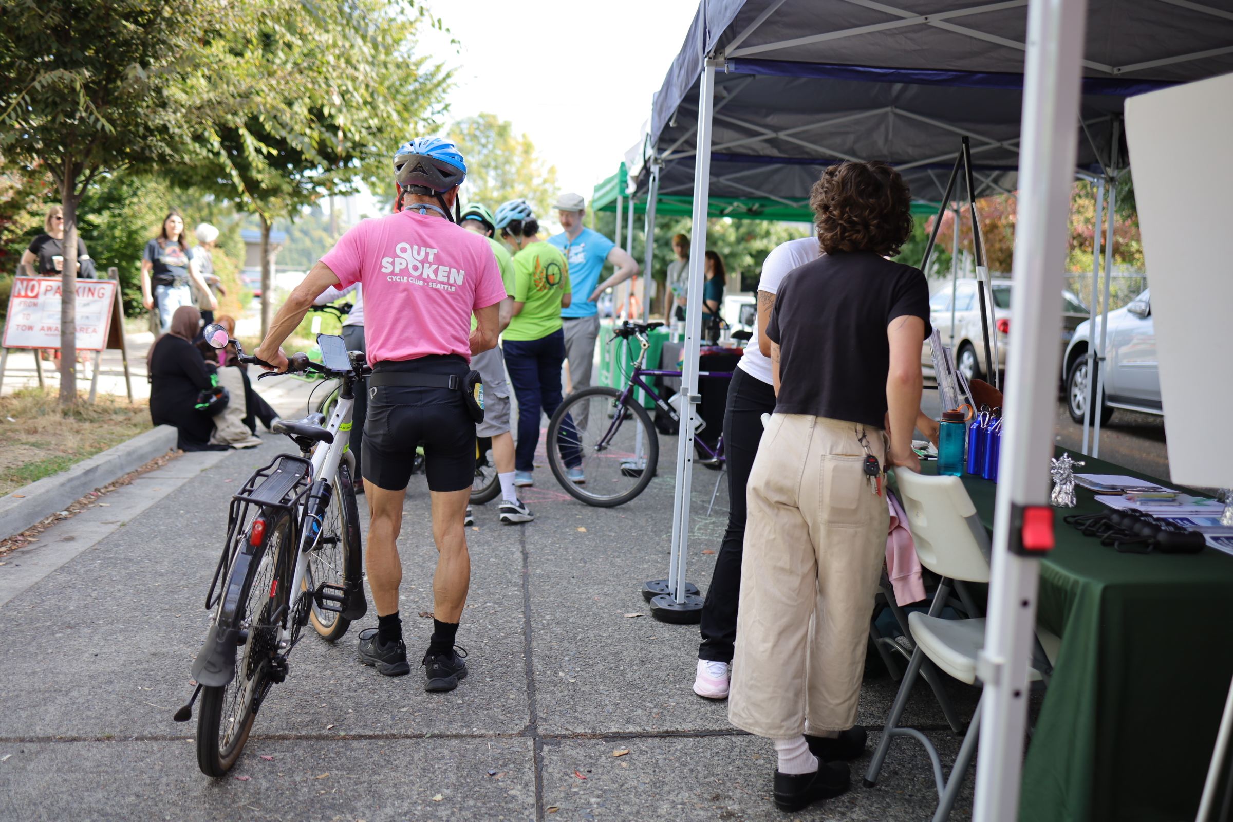 Cyclists gathered around info booths for South Seattle community organizations.
