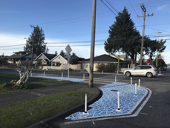 Completed pedestrian improvements at 61st Ave SW