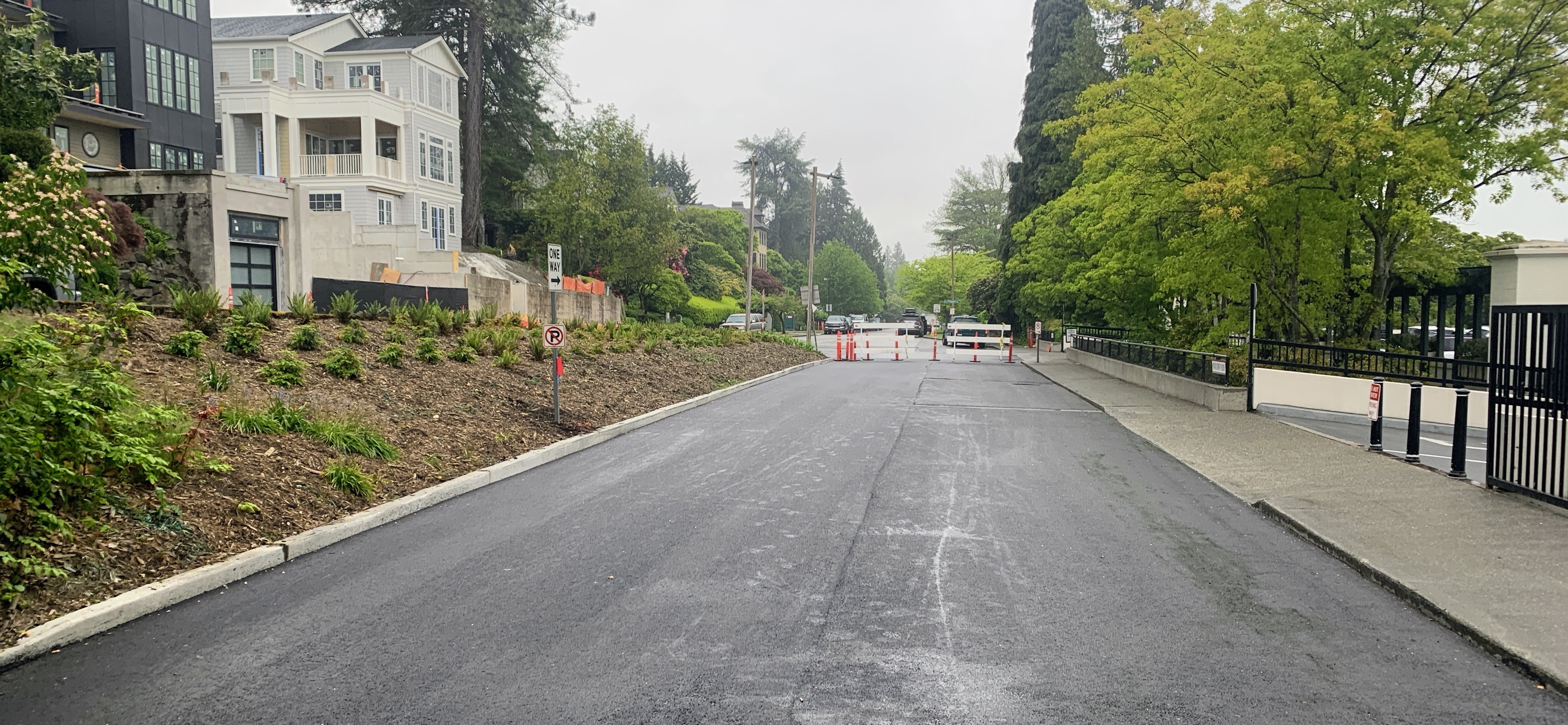 The photo shows freshly repaved McGilvra Blvd E Bridge deck (May 2025, SDOT). 