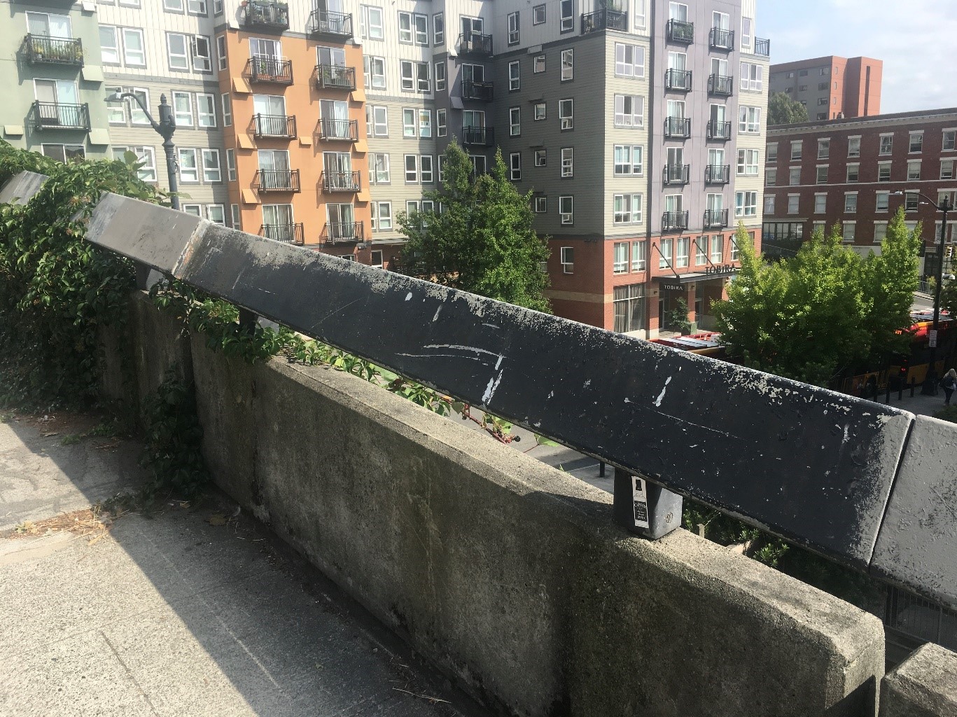 Photo showing view looking down onto 5th Ave from Yesler Bridge