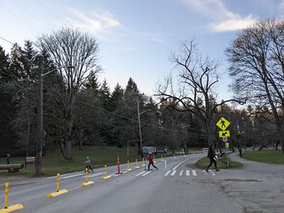 Families walking down one of the keep moving streets.