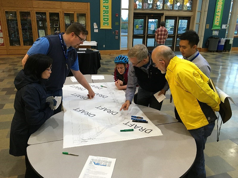 People engaging with SDOT at an outreach event