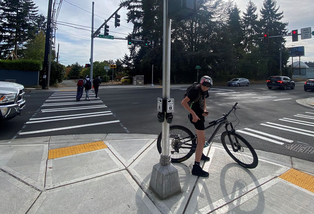 Ingraham High School students using the new signal at N 130th St and Ashworth Ave N 