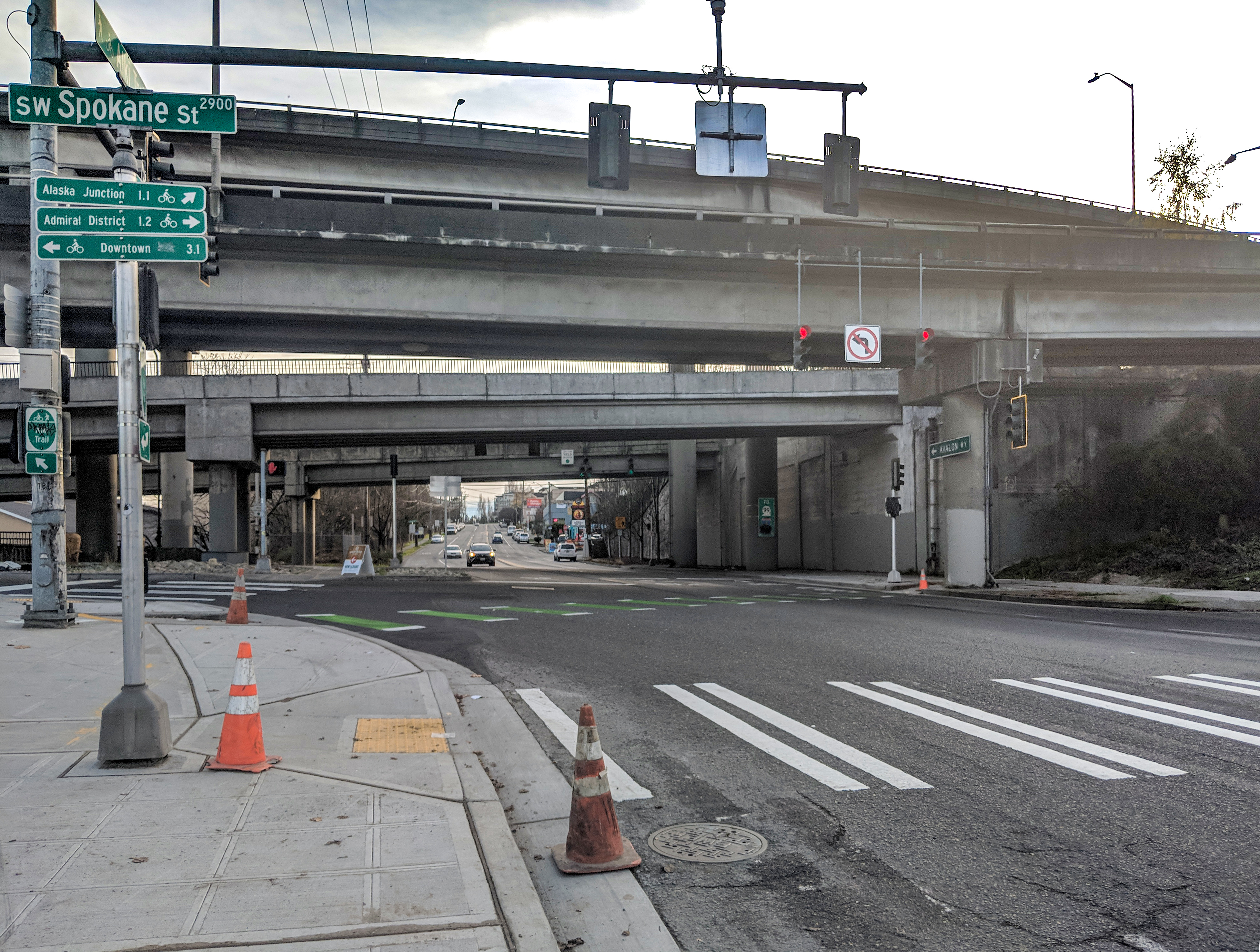 New curb bulb, crosswalk and bike crossing at the intersection of Harbor Ave SW and SW Spokane St