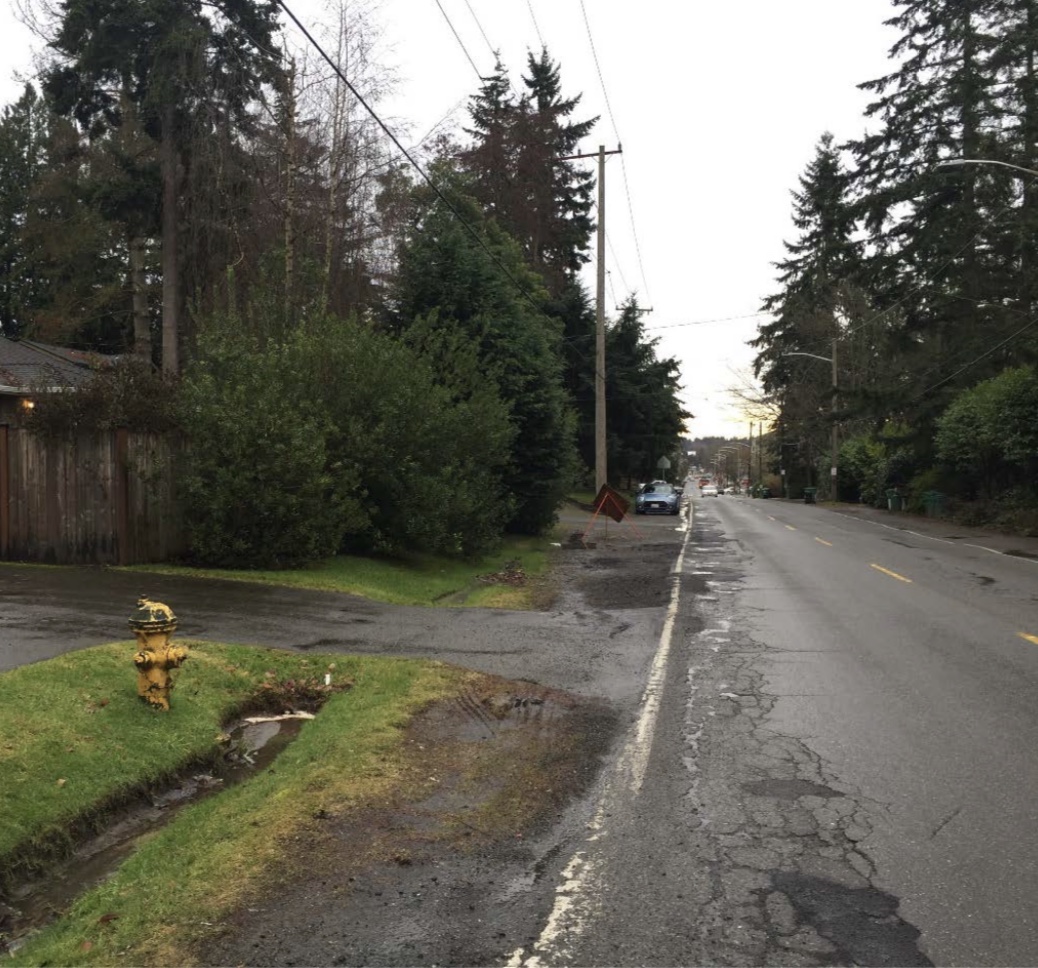 Image showing 30th Ave NE condition before phase 1 installation of sidewalk and Natural Drainage System.