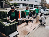 People enjoying ice cream at a Park(ing) Day installation!