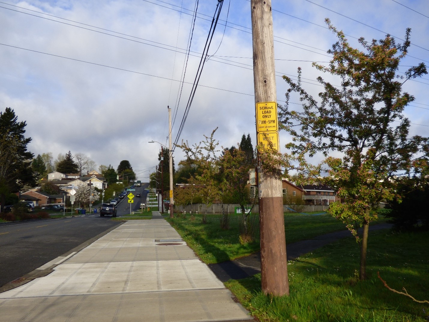 After construction: Wide sidewalk near Dearborn Park Elementary School and Chielf Sealth Trail crossing