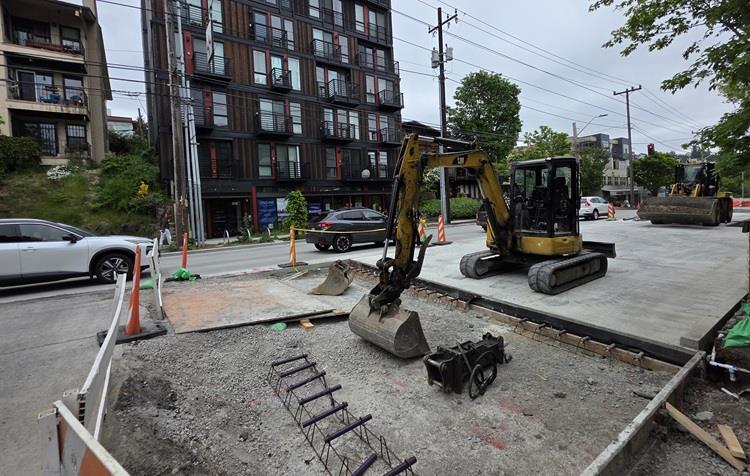 Image shows the construction team getting ready to add concrete to Eastlake Ave E near E Boston St