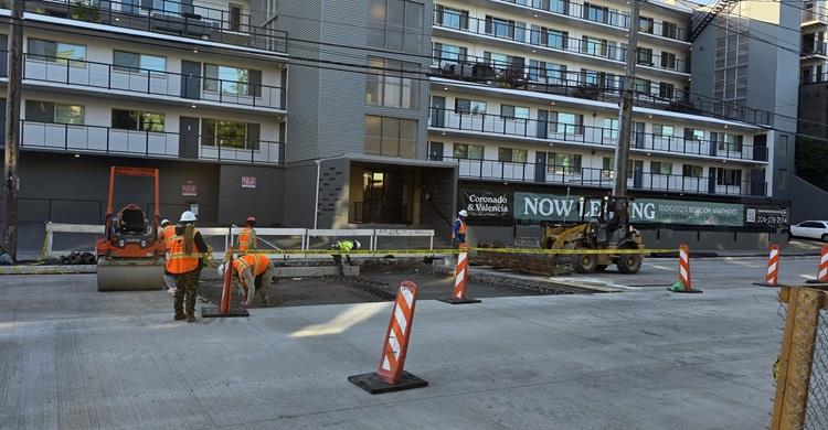 Image shows the area near the Coronado and Valencia apartments being prepared for new concrete