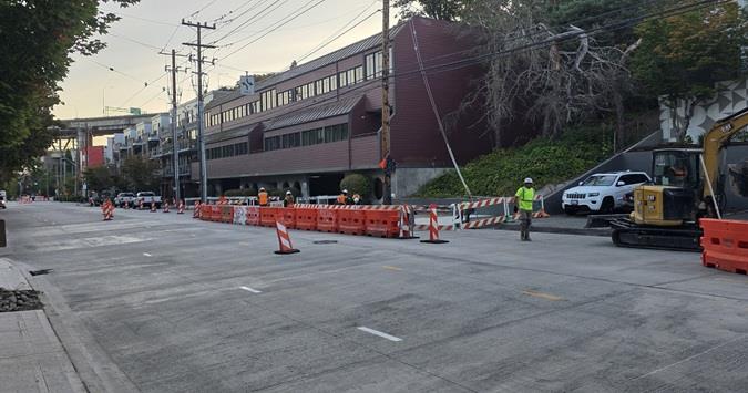 Image shows our team working on sidewalks and driveways along Eastlake Ave E