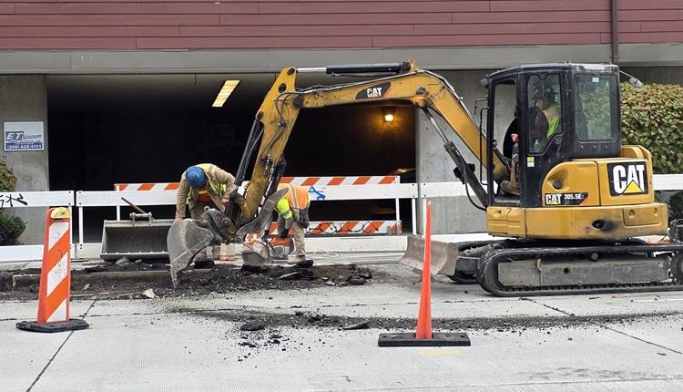 Image shows the team working on driveways along Eastlake Ave E