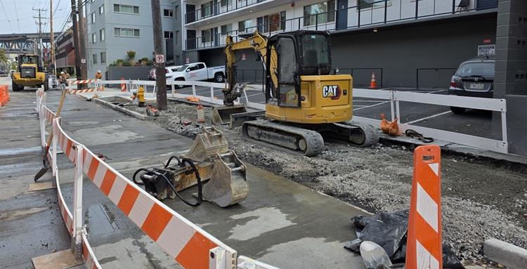 Image shows the team working on driveways along Eastlake Ave E