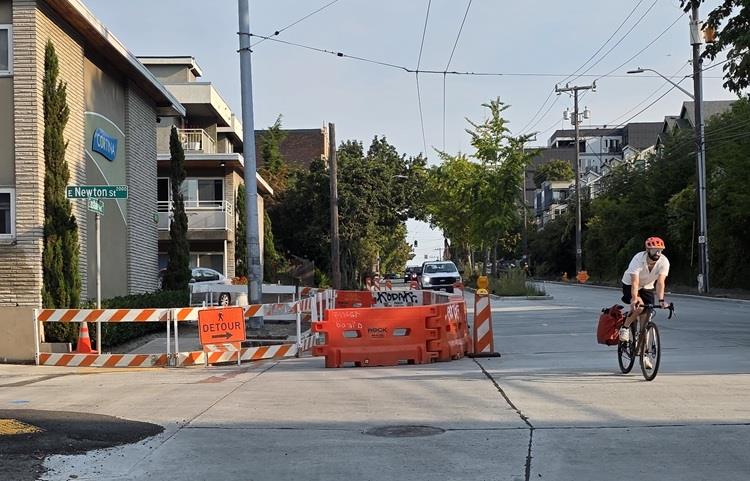 Image shows an area of sidewalk excavated on Eastlake Ave E. This corner will be updated with new pedestrian ramps making it easier for people to get to the bus stops