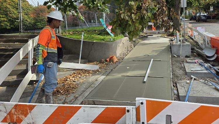 Image shows sidewalk work on Eastlake Ave E and E Louisa St.