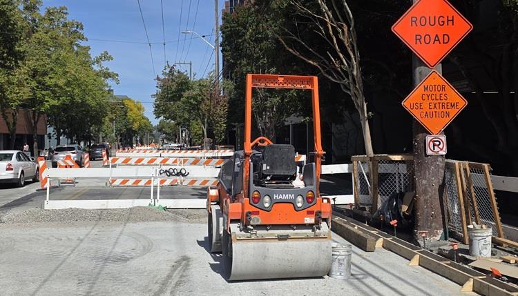 Image shows areas of new street surface along Eastlake Ave E between E Lynn St and E Louisa St. 