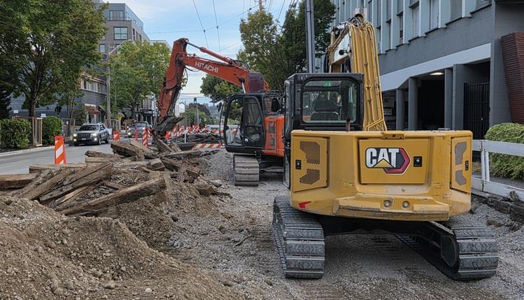 Image shows railroad ties that have been removed from Eastlake Ave E during construction of the new street