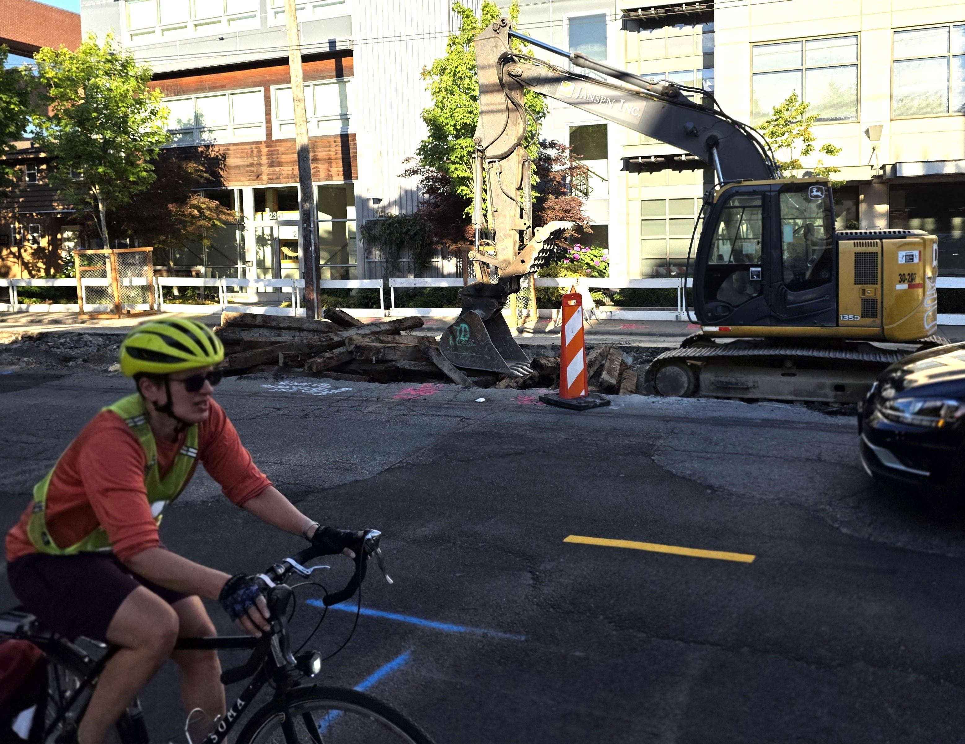 Image shows old wooden beams among concrete debris on Eastlake Ave E.
