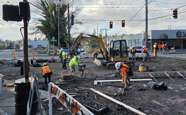 The construction team is prepping the area for concrete at the intersection of E Allison St and Eastlake Ave E