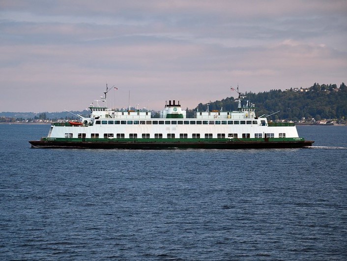 An image of a WSDOT ferry crossing between Vashon and West Seattle