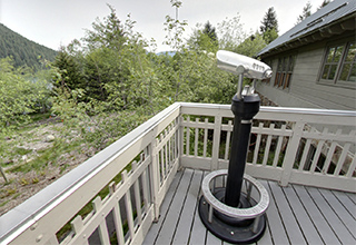 On the deck with the telescope.