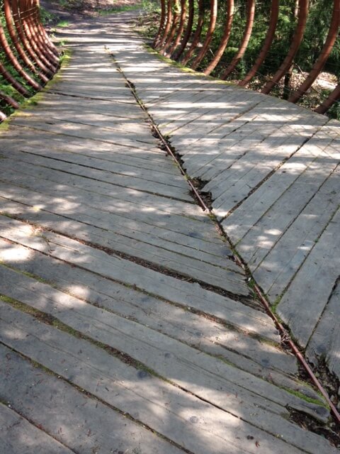 Salmon Bone Bridge, weathered wooden decking.