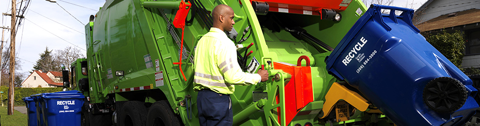 Photo of a recycling truck being loaded