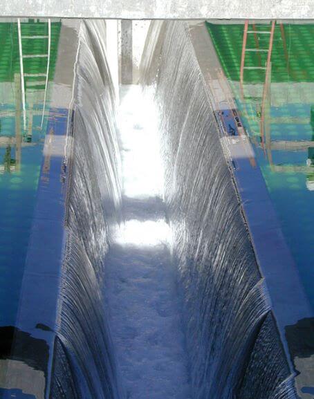 Photo of the Tolt Treatment Facility, showing waterfalls on each side of photo