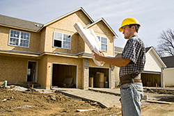 Photo of man at construction site