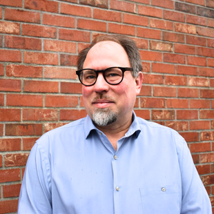 Headshot of John Persak