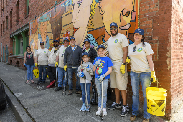 Volunteers with buckets and litter pickers