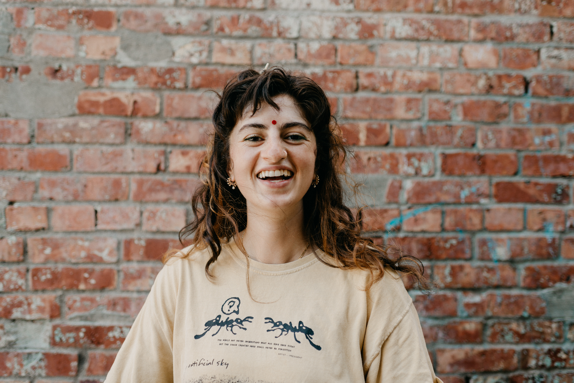Portrait of Monika Sharma smiling at the camera