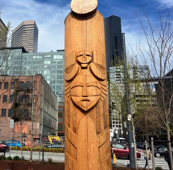 A wood carving that honors a warrior, representing “strength and honor for the people.”