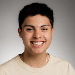 Picture of Commissioner smiling.